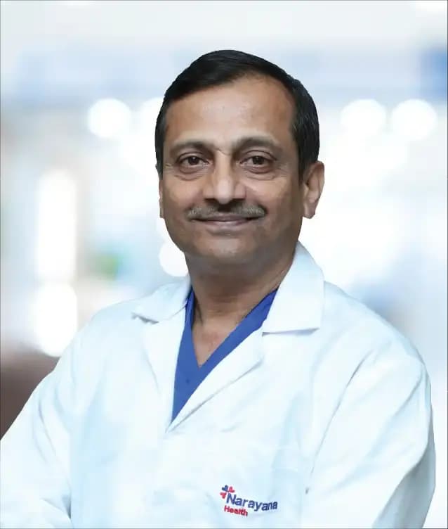 Dr. Mallesh P