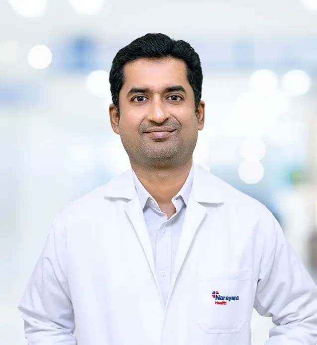 Dr. Kiran R