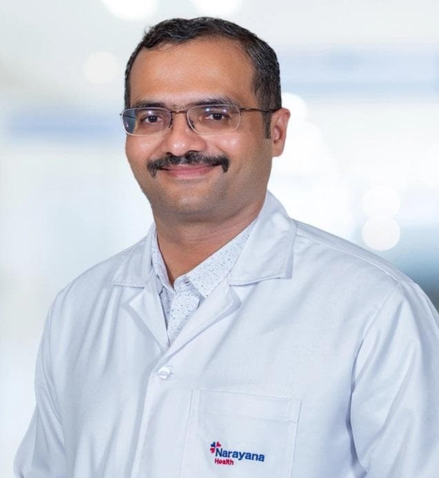 Dr. Avinash K S