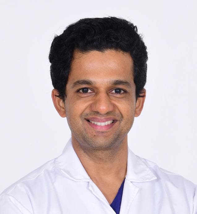 Dr. Vivek M A