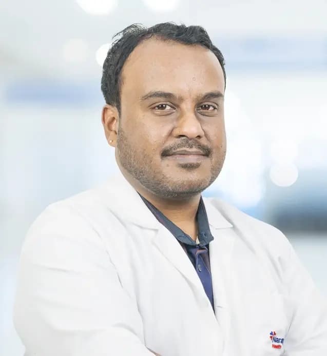 Dr. Ganesh B