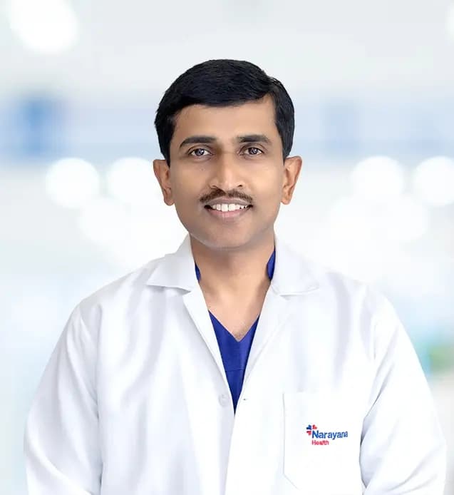 Dr. Kiran K